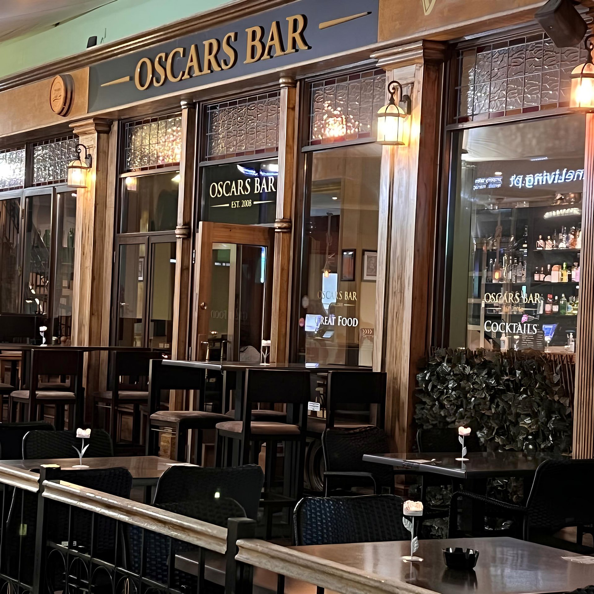 The Oscars Bar frontage in Vila Sol Plaza at night